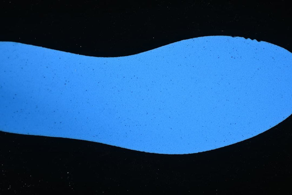 Blue-lit view of the shoe's insole