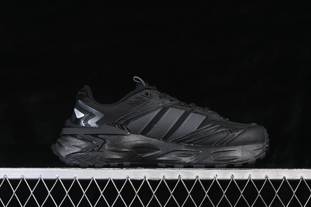 Side profile of the black sneaker