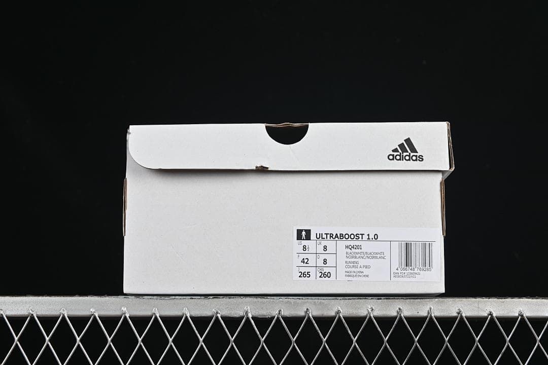 Shoe box label identifying UltraBoost 1.0, style HQ4201, and sample size EU 42.