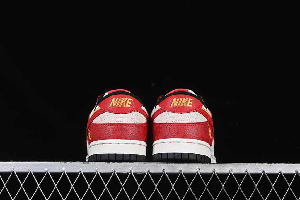 Rear view of the pair showing red heel panels and light-colored midsoles