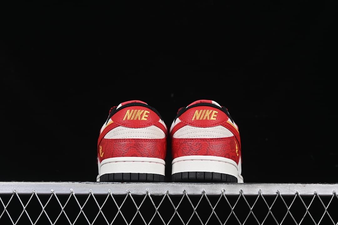 Rear view of the pair showing red heel panels and light-colored midsoles