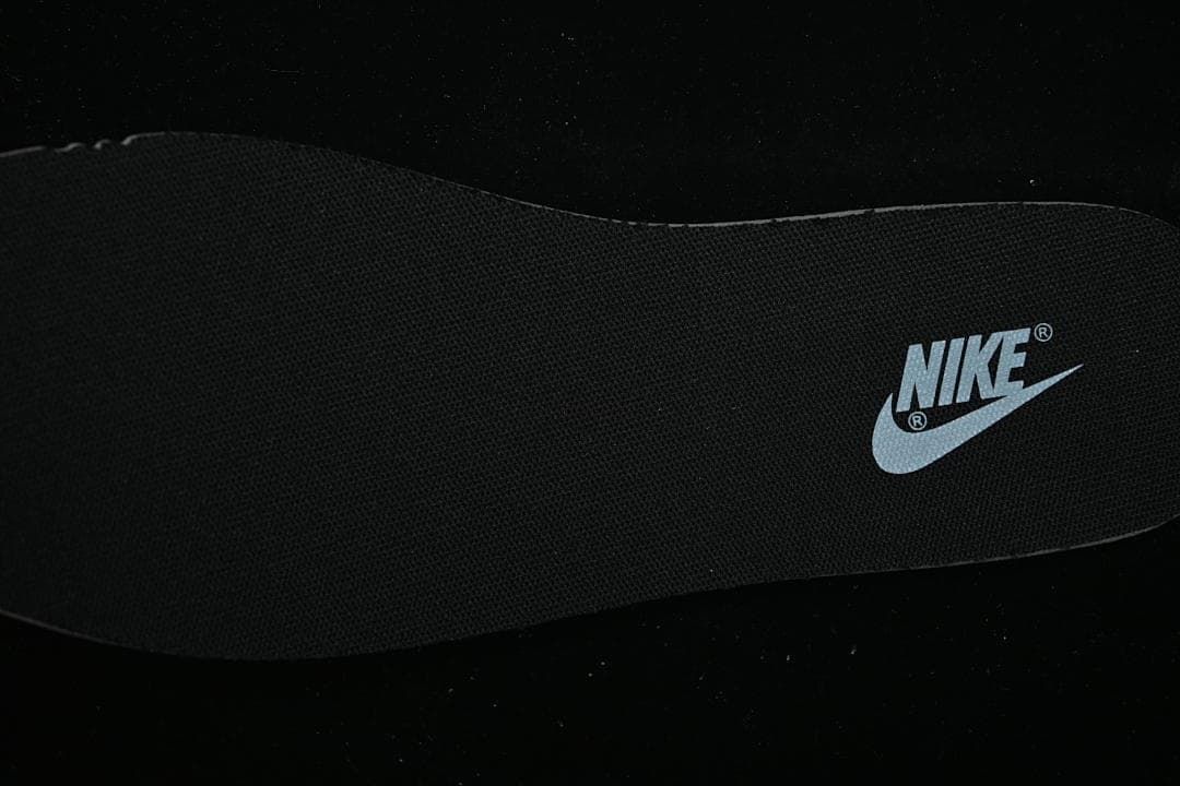 Close-up of a black insole with Nike branding