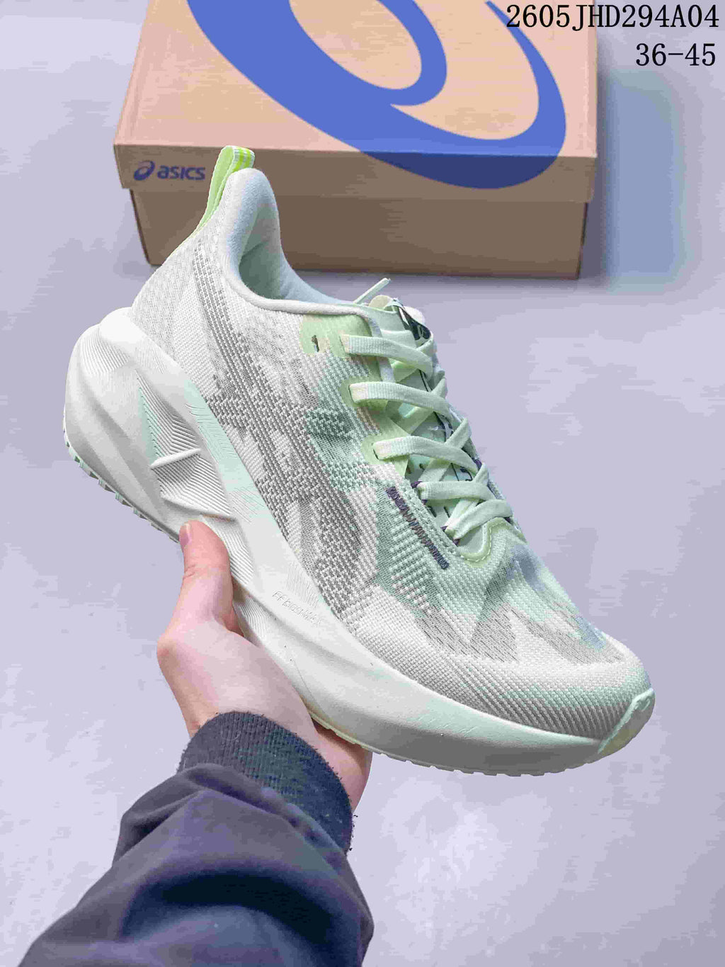 White and mint ASICS NOVABLAST 5 LE running shoe