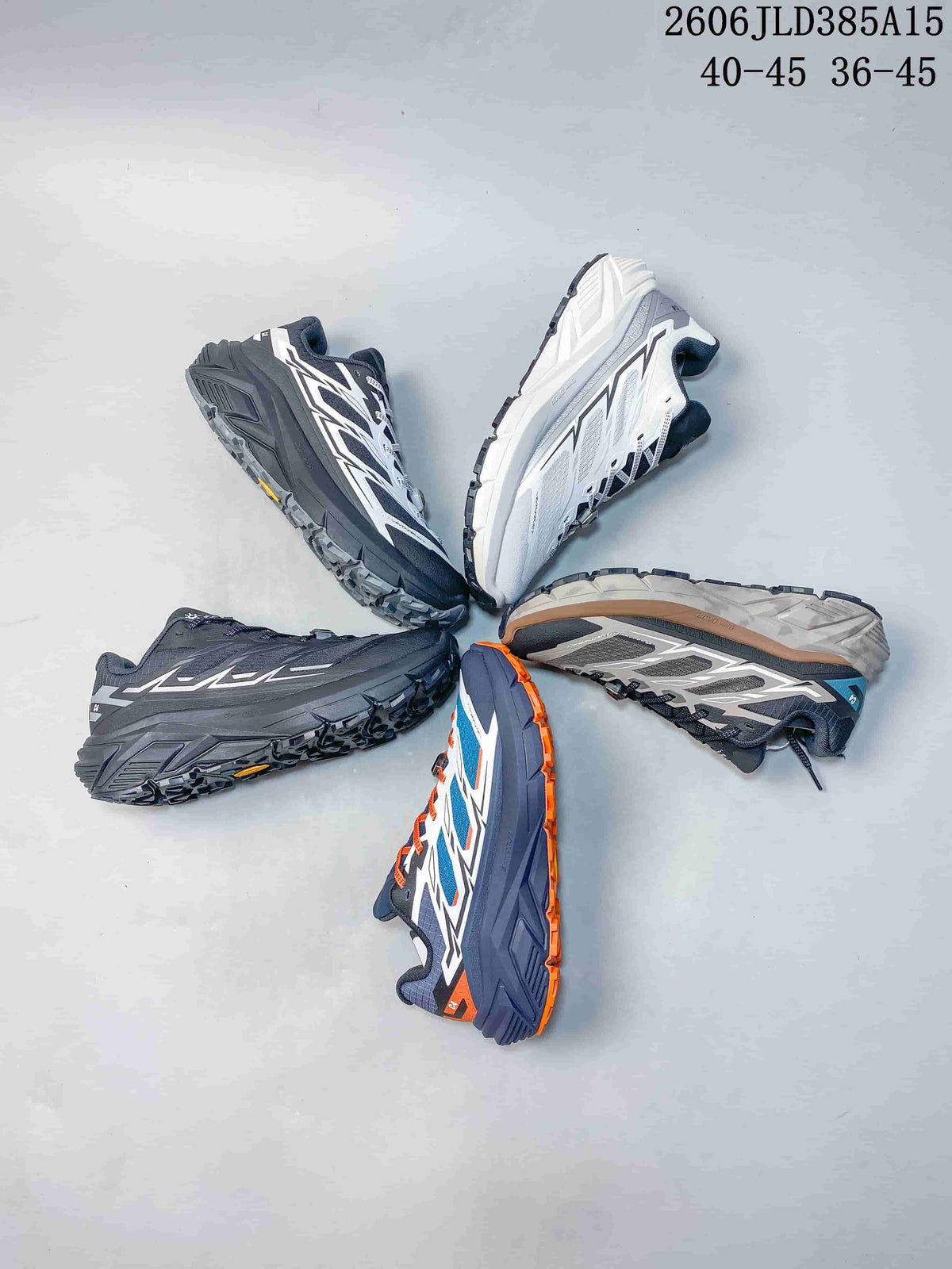 Light gray Kailas C4 trail shoe with a navy tongue and dark outsole.