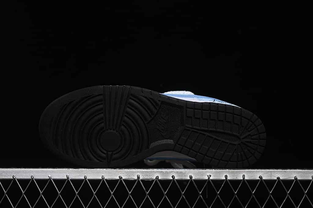 Black patterned outsole of a low-top sneaker