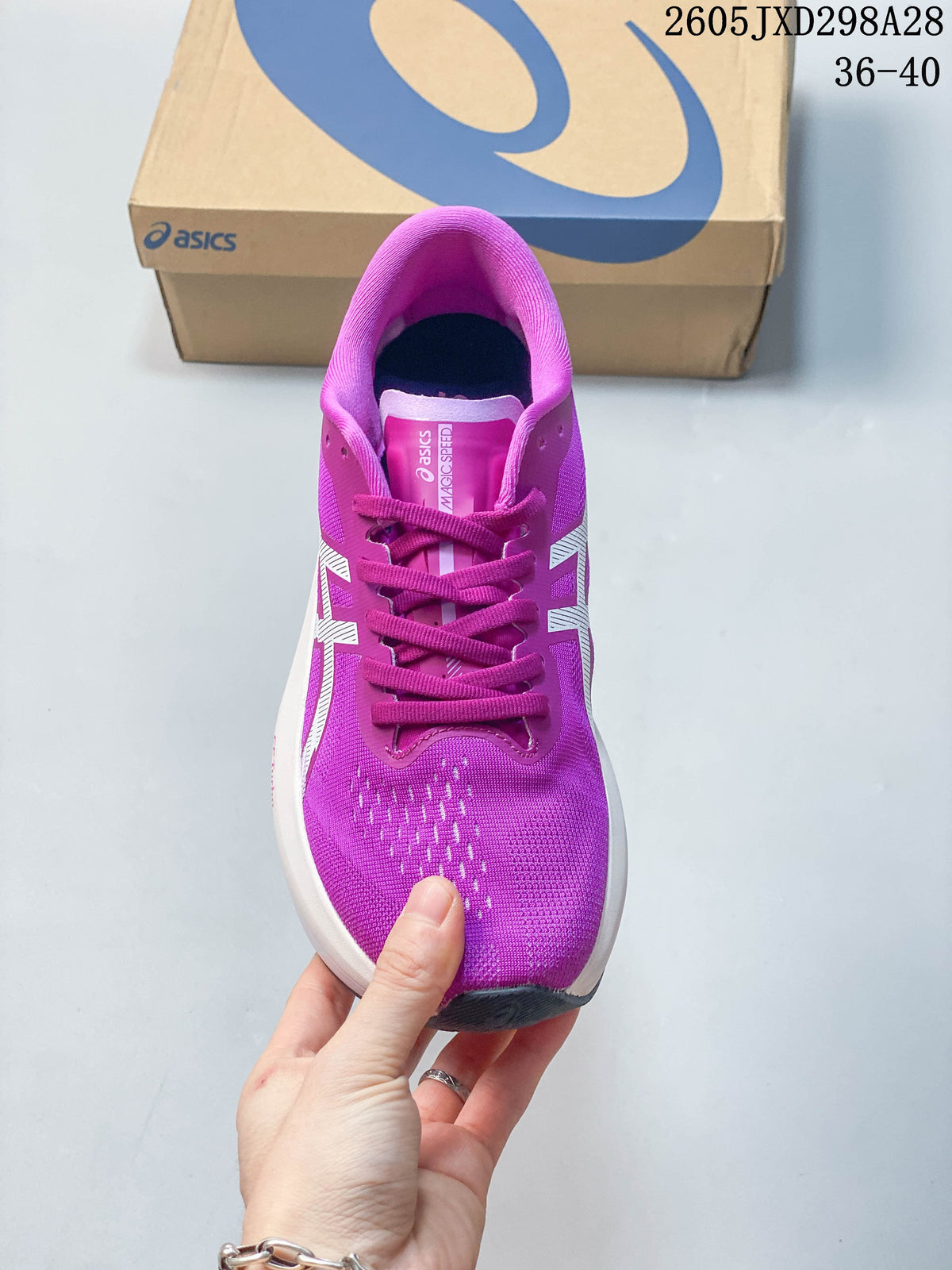 Top view of the purple lace-up ASICS running shoe