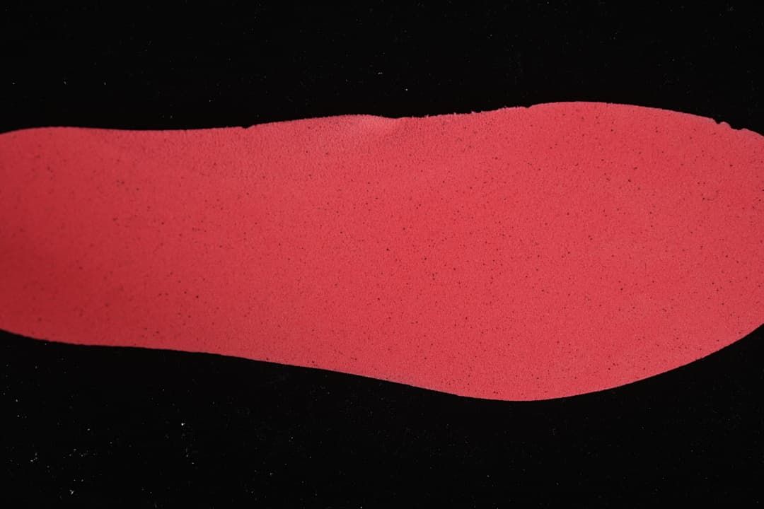 Red footbed shown separately against a dark background.