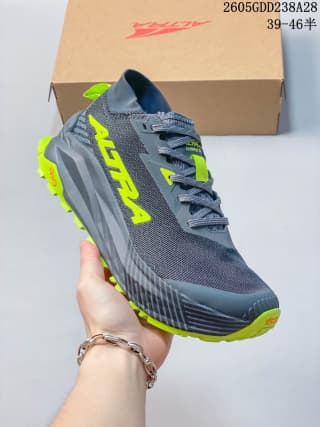 Gray and neon yellow-green Altra Olympus trail shoe shown from the side