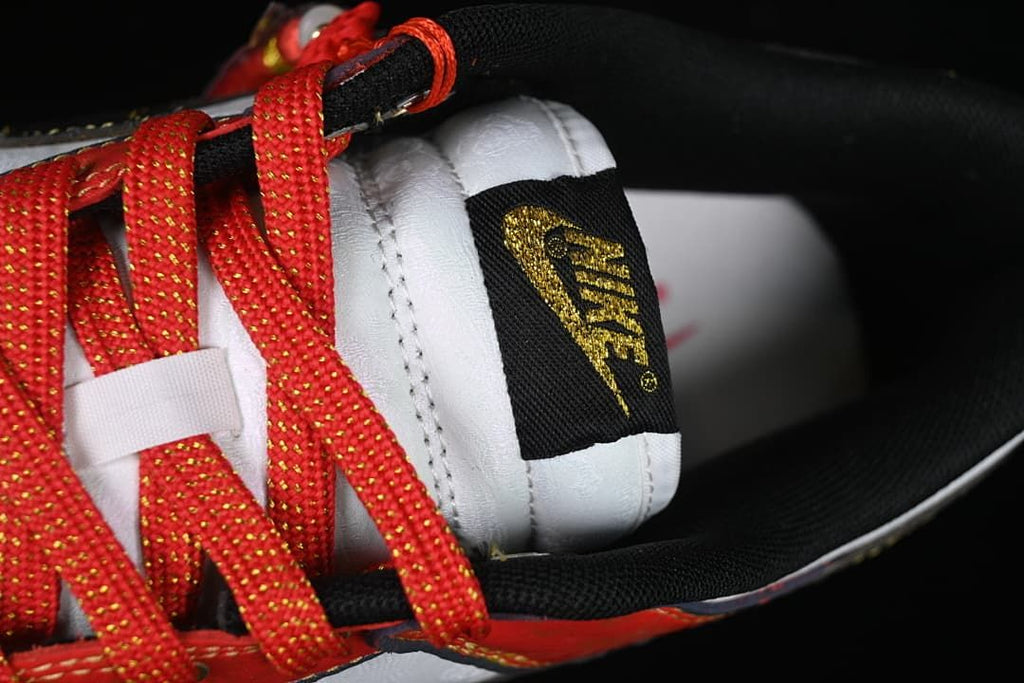 Close-up of red laces and the tongue label