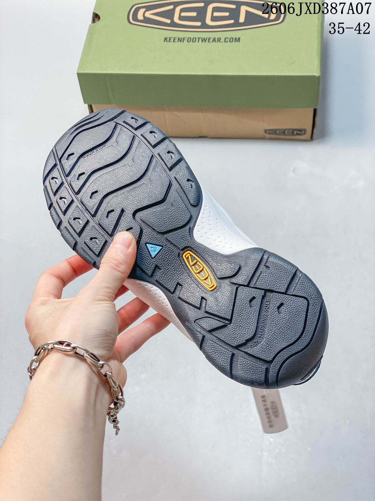 Close-up of the sandal outsole with a patterned tread.