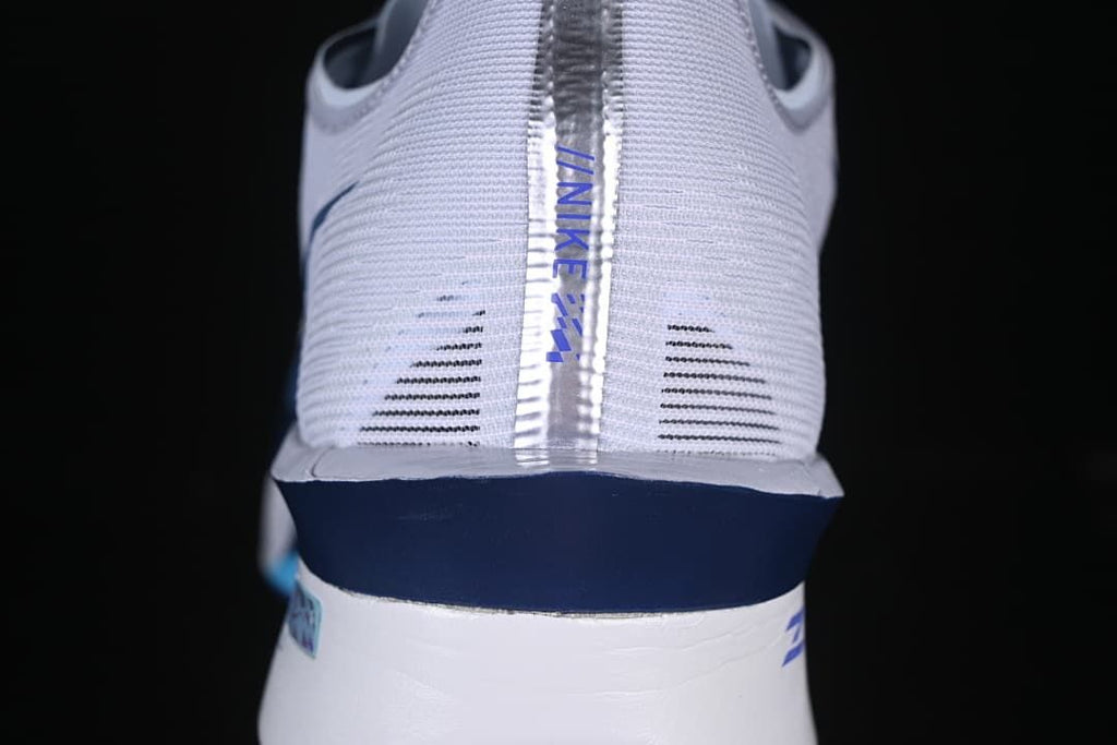 Rear view showing the shoe’s heel and sole construction
