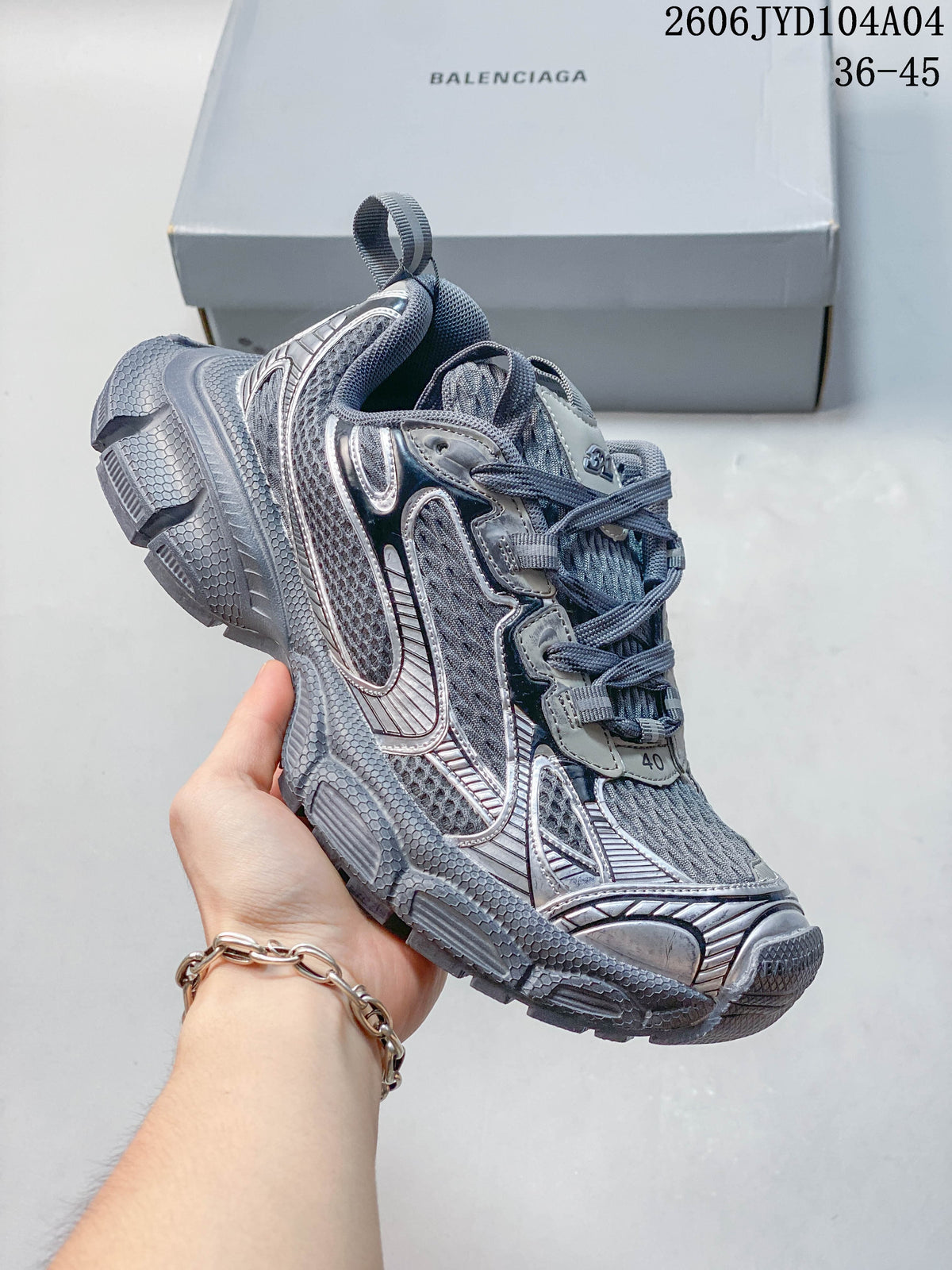 Angled side view of a metallic gray Balenciaga 3XL sneaker; image overlay states sizes 36–45.