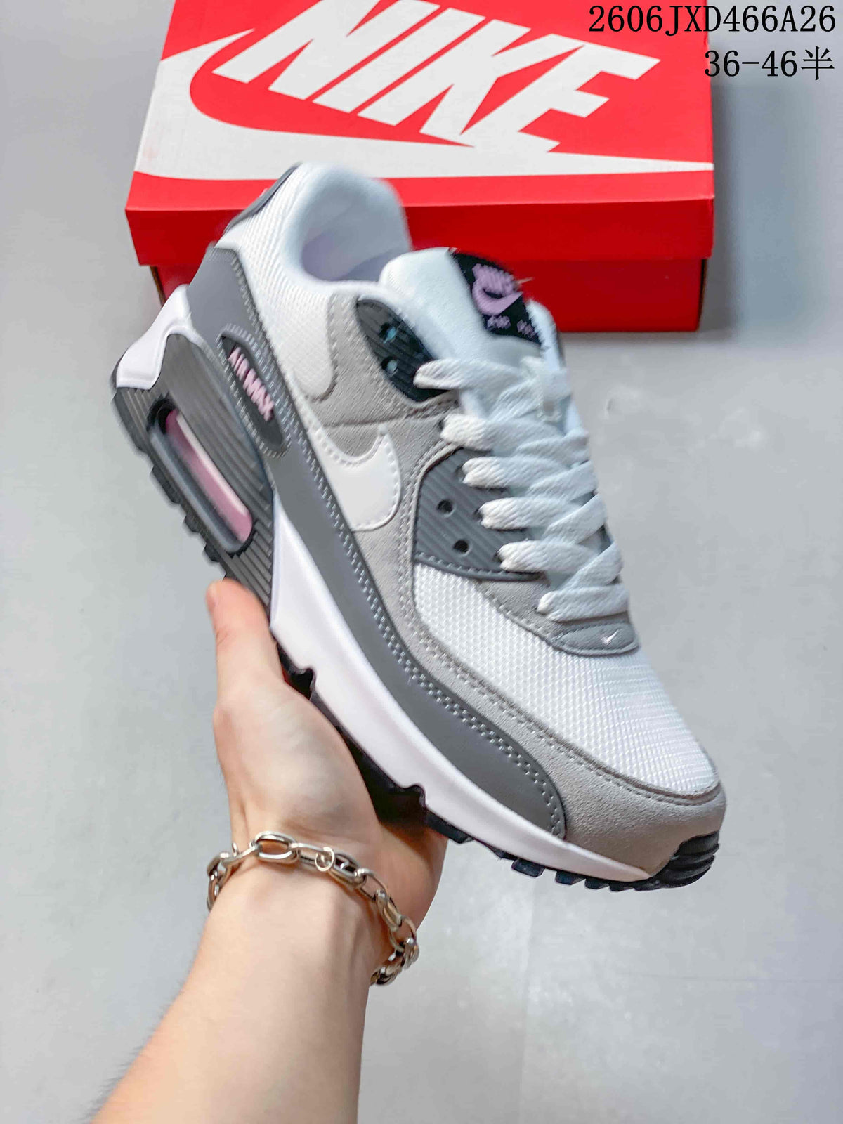 Gray and white Nike Air Max 90 sneaker with dark gray accents