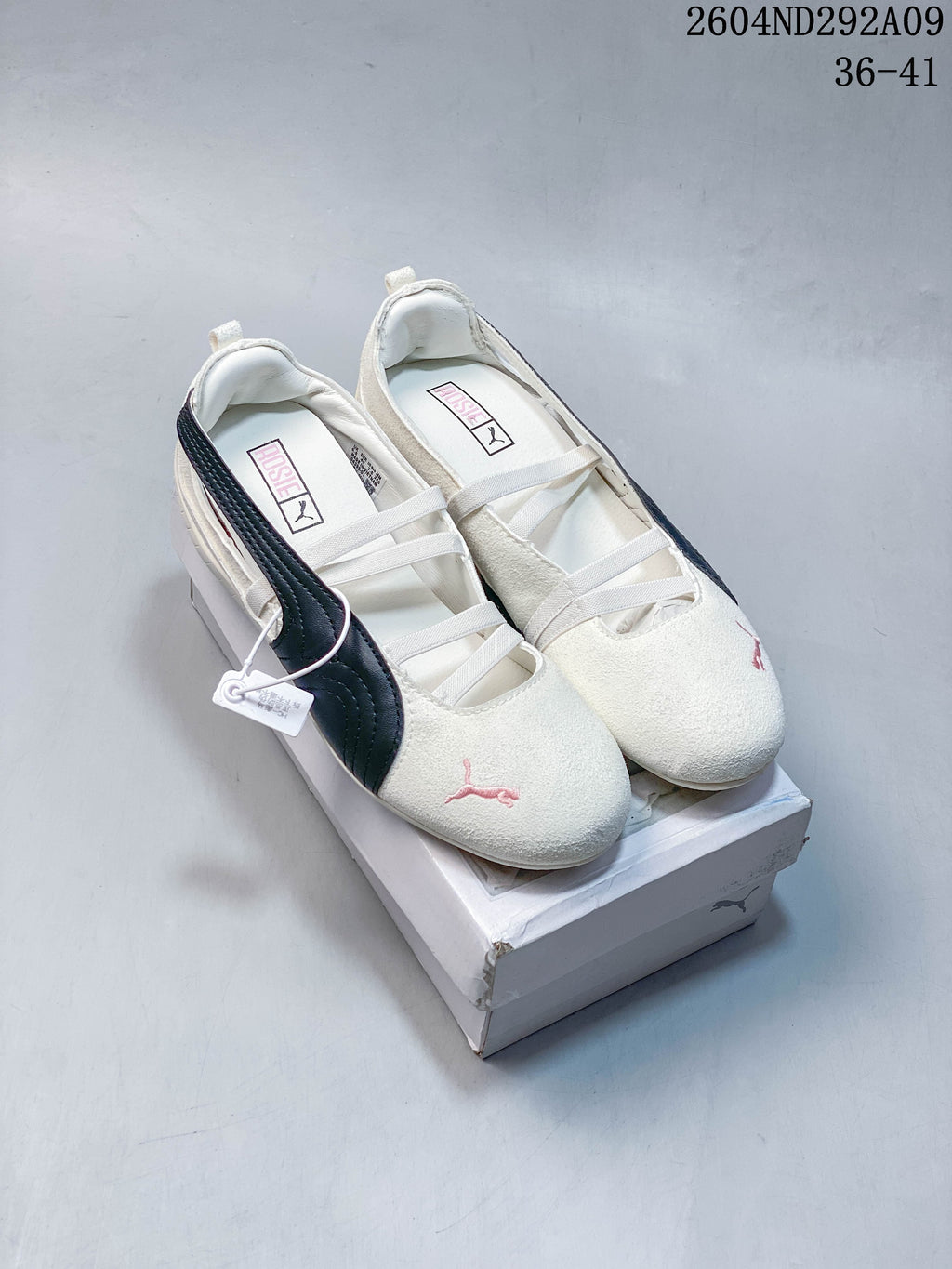 Pair of cream Puma Speedcat Ballet sneakers with navy side stripes and pink details