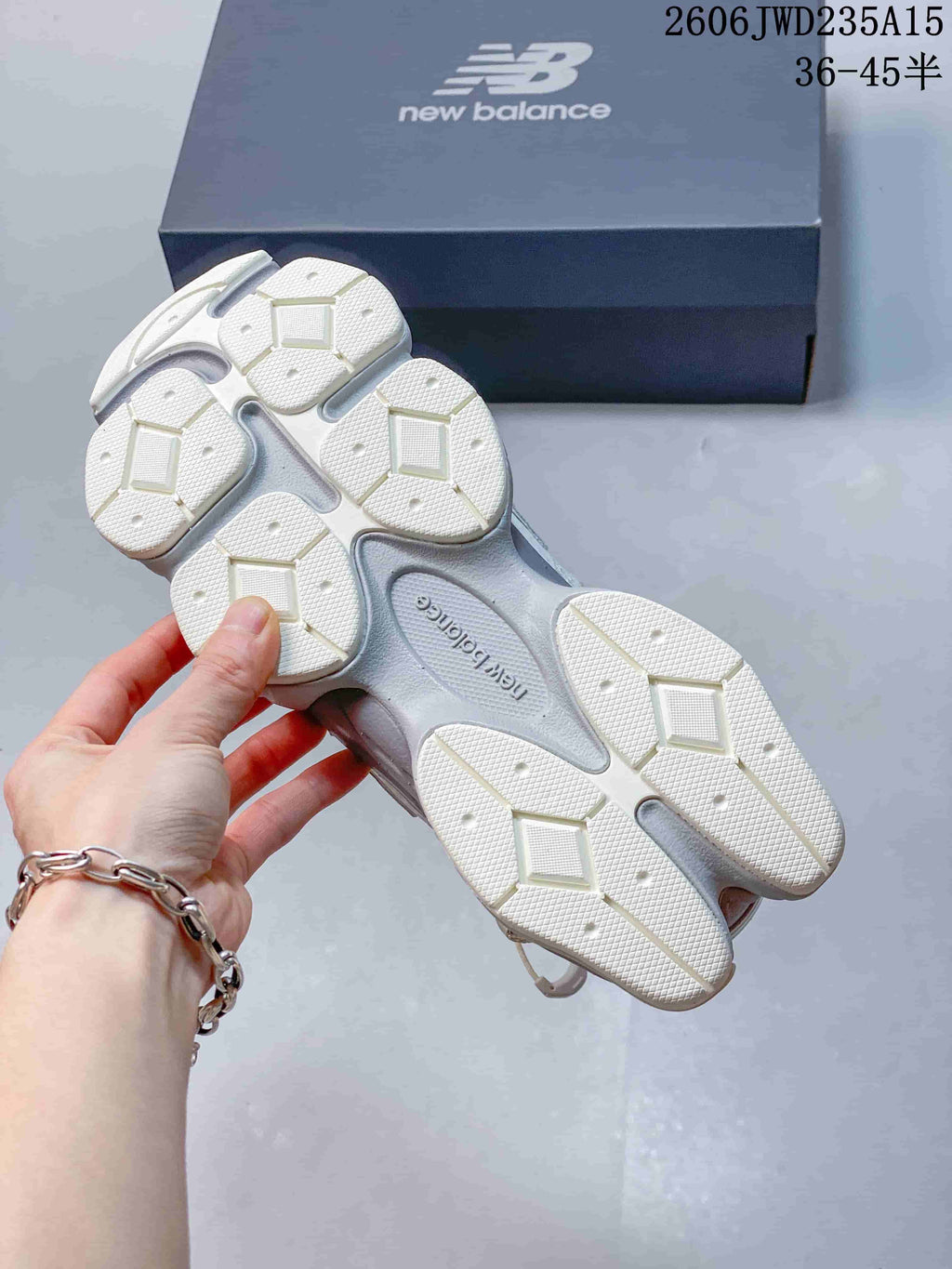 Underside of a New Balance 9060 sneaker showing the segmented sole