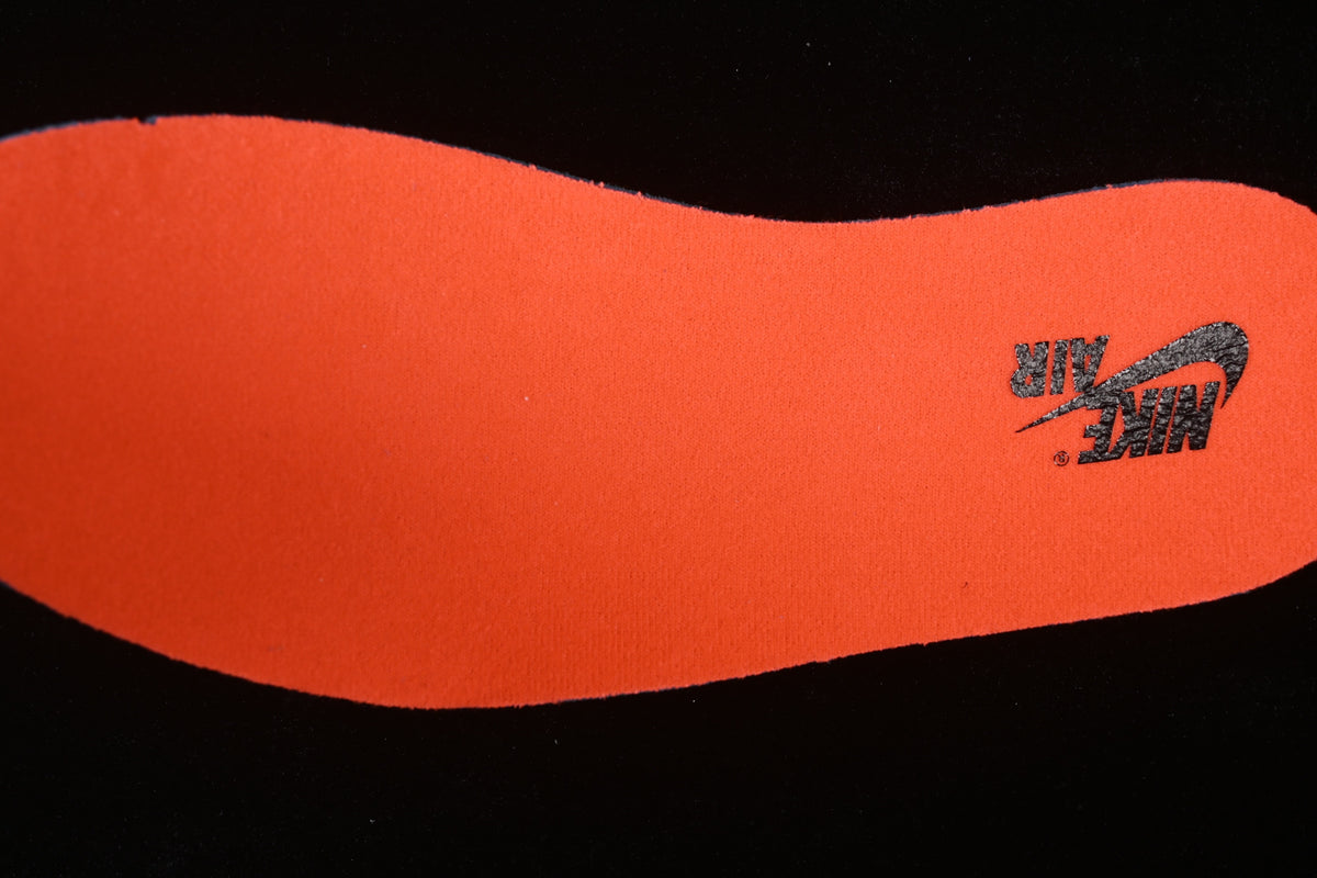 Bright orange insole with Nike Air branding