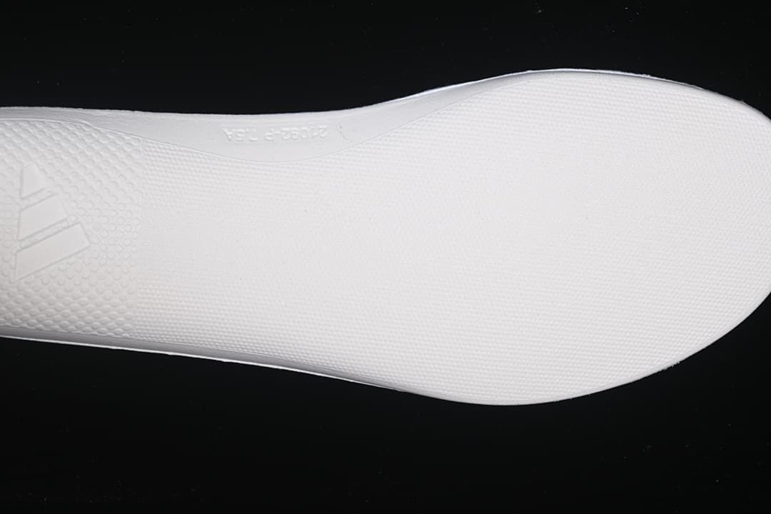 Close-up of the textured white shoe outsole