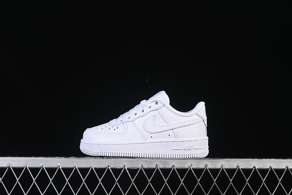 White Nike Air Force 1 ’07 LE kids’ low-top sneaker in side profile