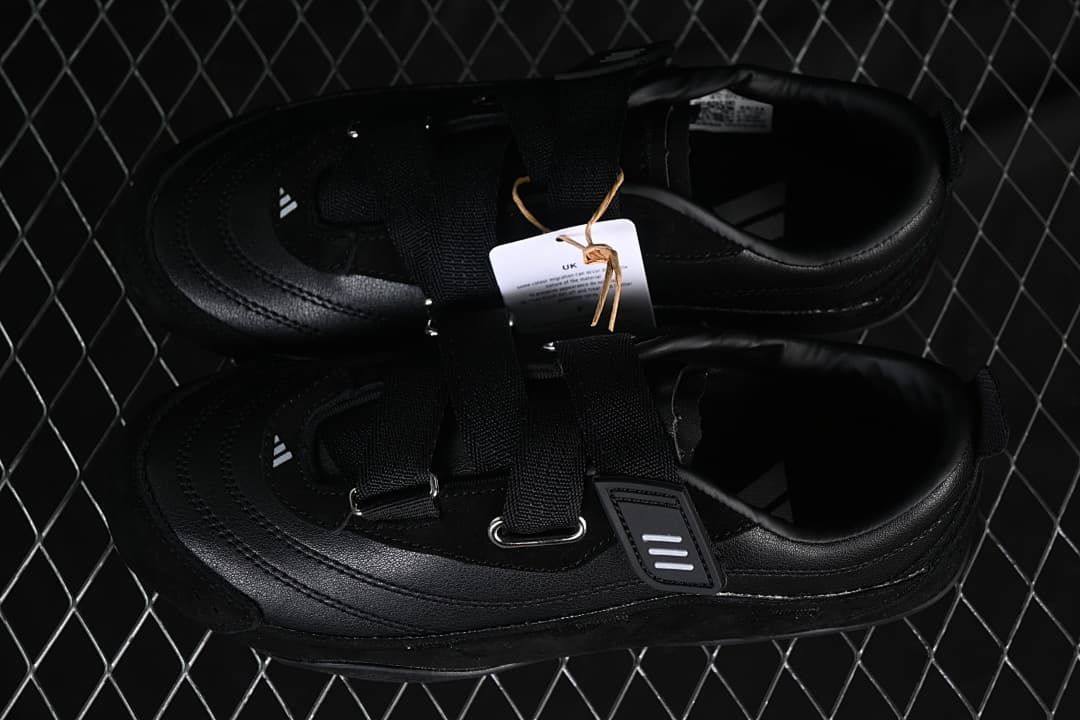 Pair of black sneakers shown from above