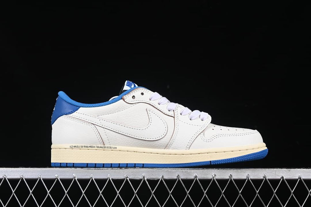 Side view highlighting the off-white upper and blue outsole
