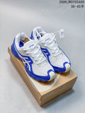 White and blue ASICS GEL-TRUCK sneakers shown from above on a shoebox.