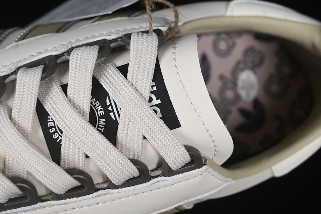 Close-up of the laces, eyelets, and patterned insole