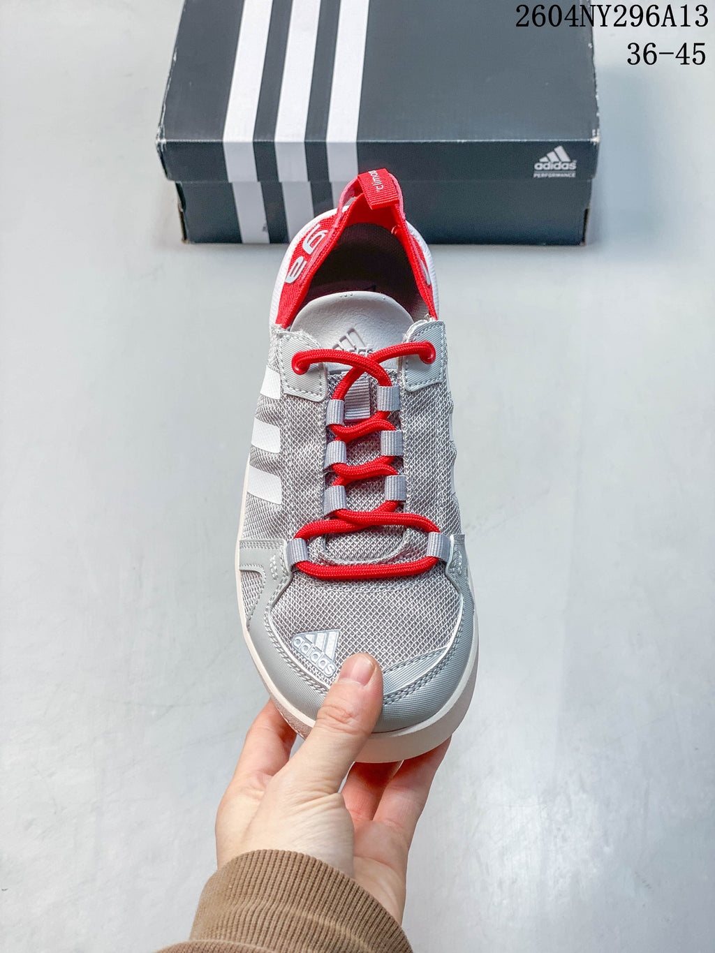 Front view showing the mesh-look upper and red laces