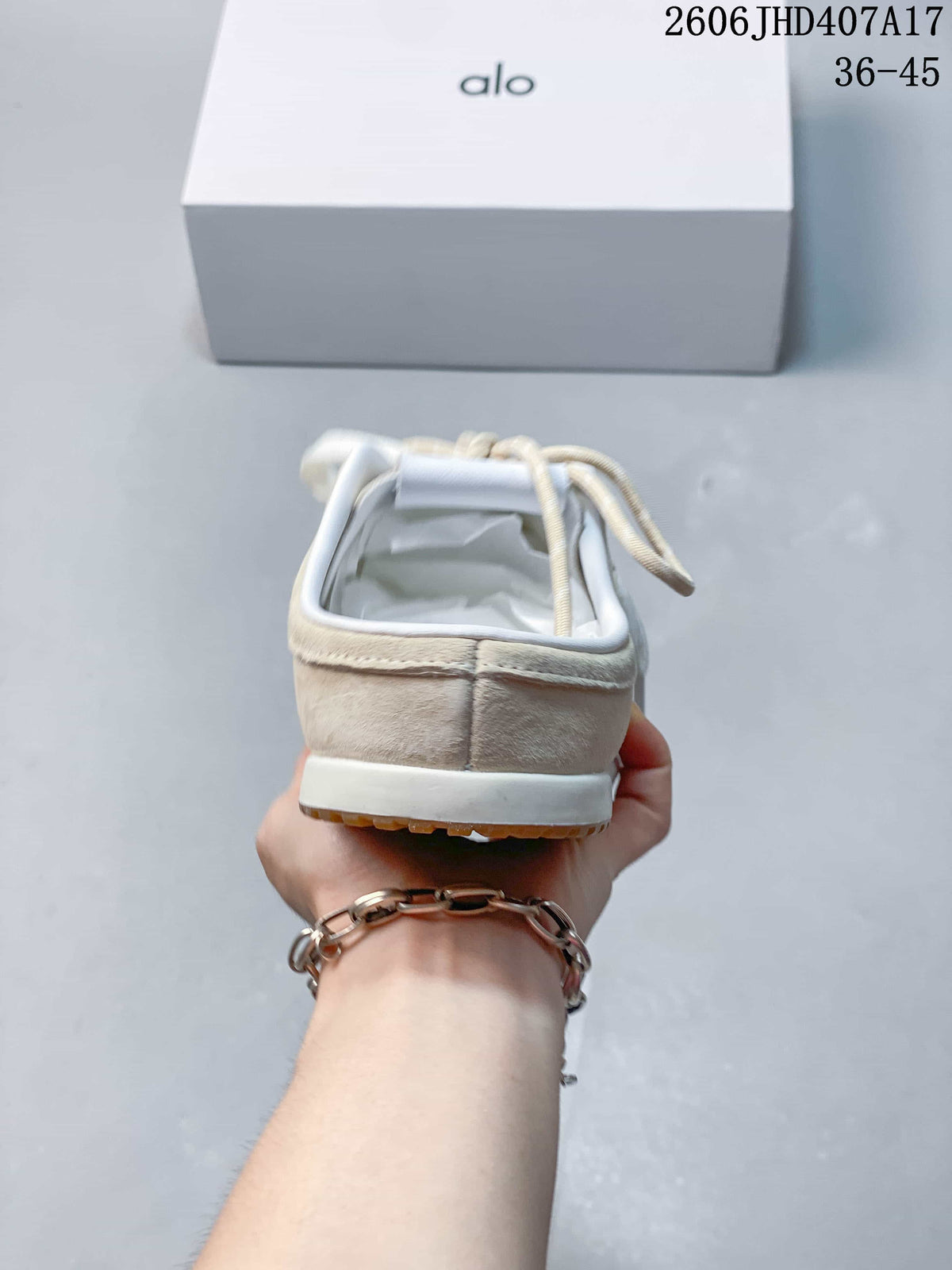 Rear view showing the heel, white midsole and gum outsole