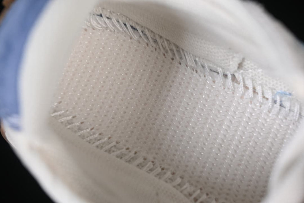 Close-up view of the sneaker's inner lining and stitching.