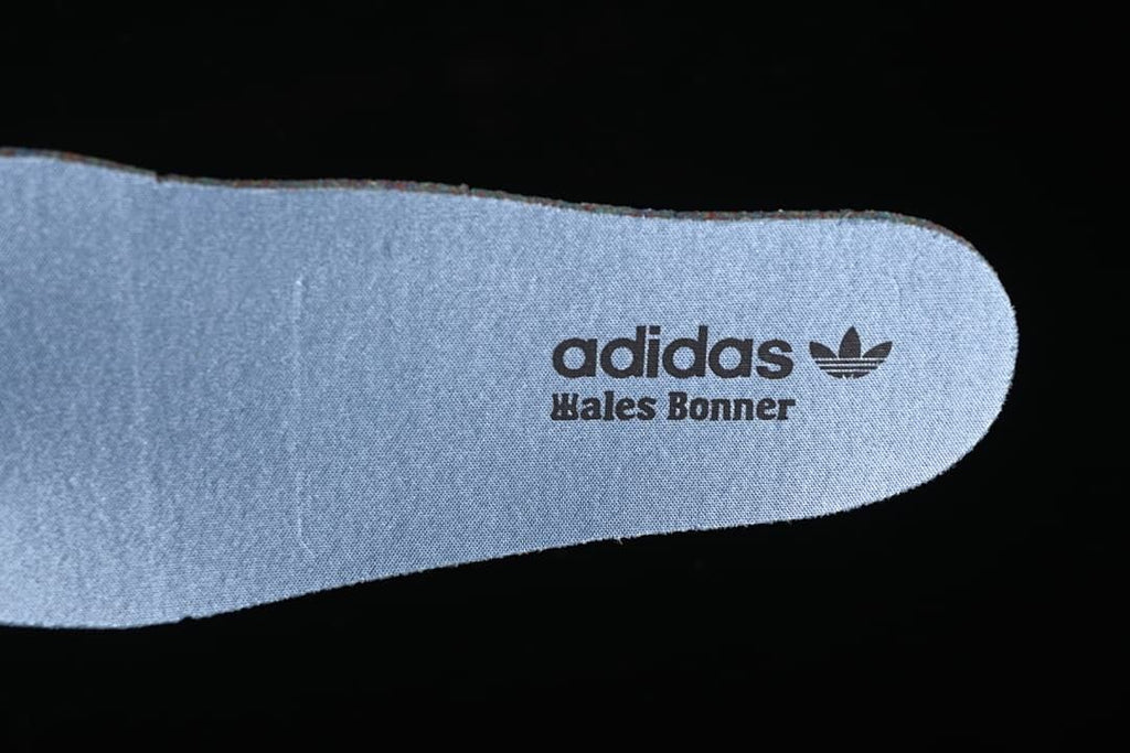 Close-up of the insole printed with adidas Wales Bonner branding