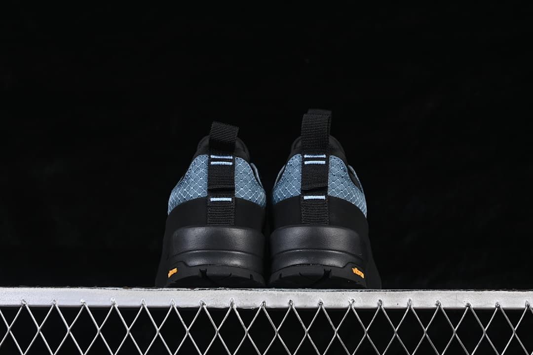 Rear view of the pair showing heel pull tabs and outsole branding.