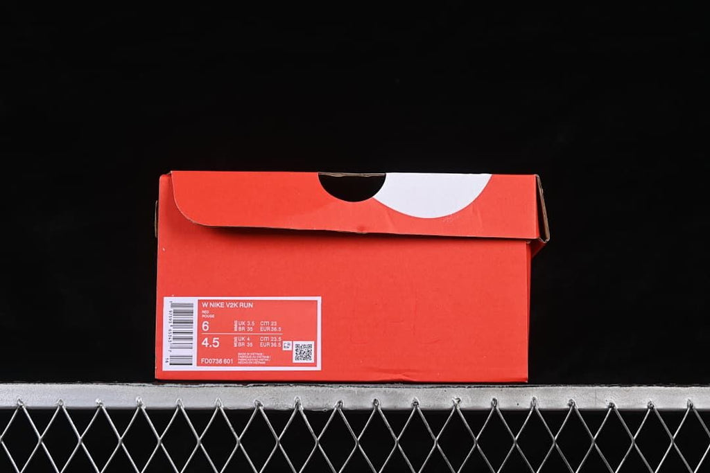 Shoe box label showing Nike V2K Run, model FD0736-601, and sample size information