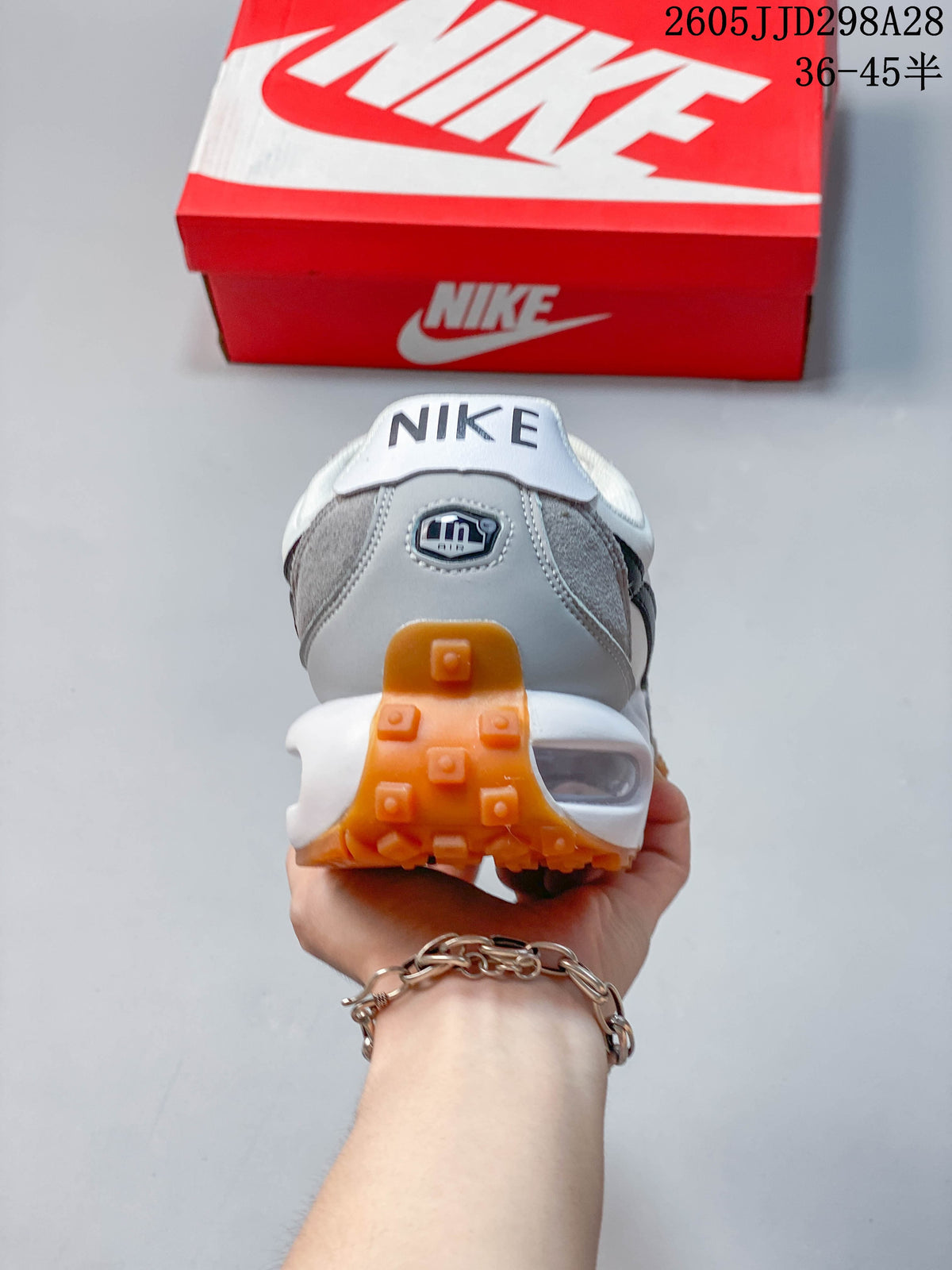 Rear view of a Nike Air Max Waffle SP sneaker showing the heel and visible air-cushioned unit.