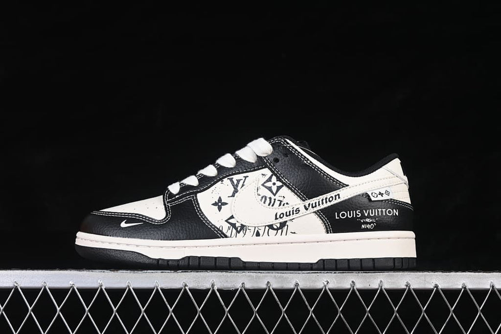 Side view of a cream and black low-top sneaker with printed panels and white laces