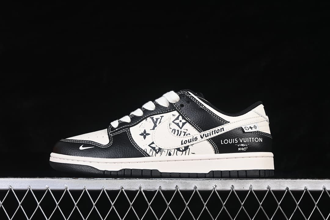 Side view of a cream and black low-top sneaker with printed panels and white laces