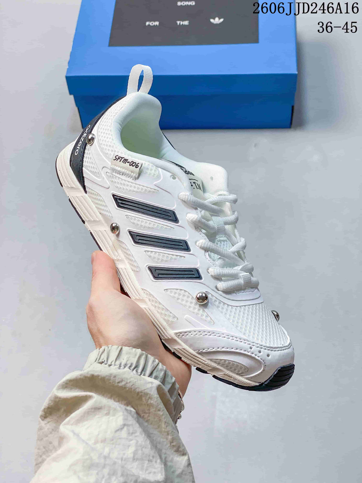 Side view of a white Adizero PR SFTM-006 sneaker