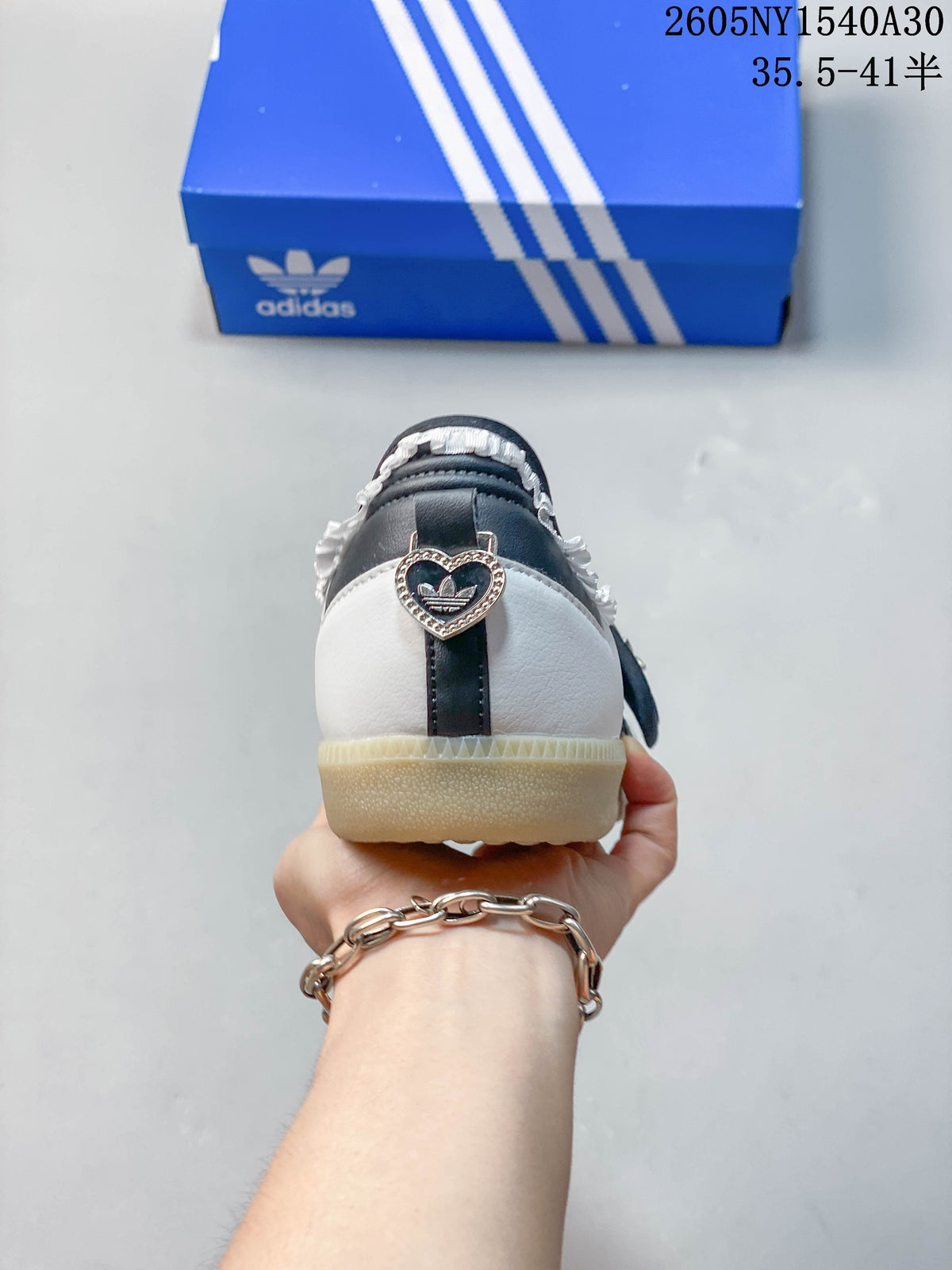 Rear view showing the heel detail and gum-tone sole of a Samba Jane sneaker