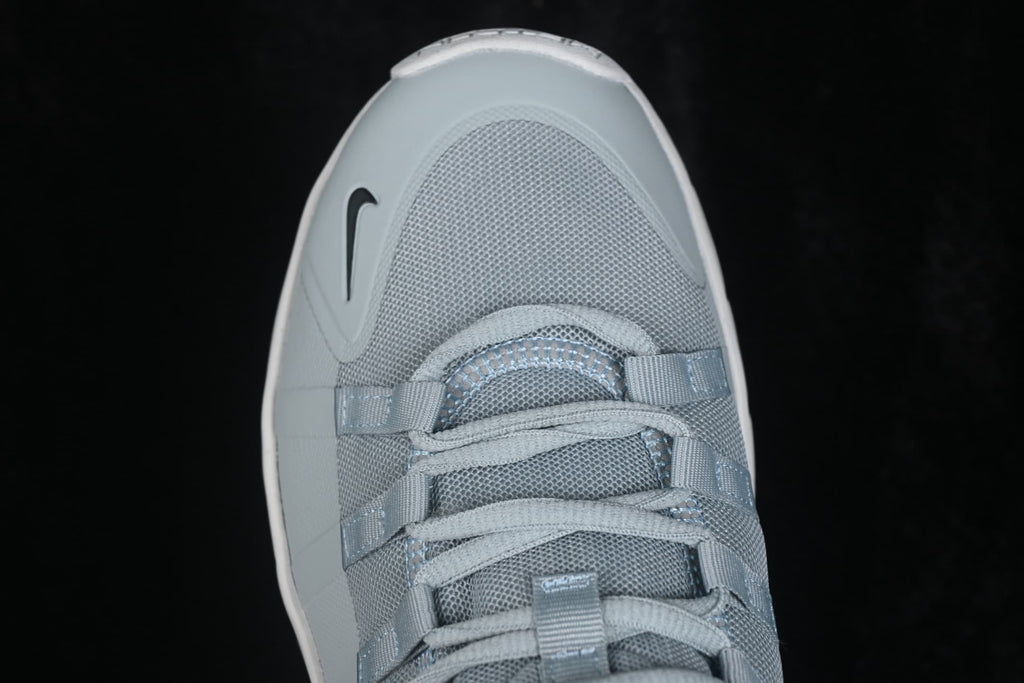 Close-up top view of the mesh toe box, laces and Nike side branding.