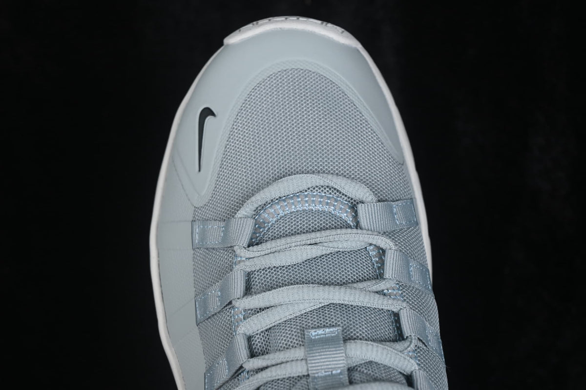 Close-up top view of the mesh toe box, laces and Nike side branding.