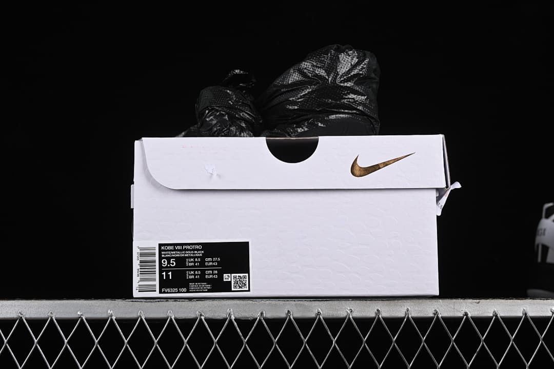 Nike shoe box with label identifying Kobe VIII Protro and a sample size.