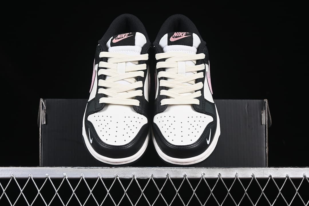 Front view of the pair showing perforated toes and cream-colored laces