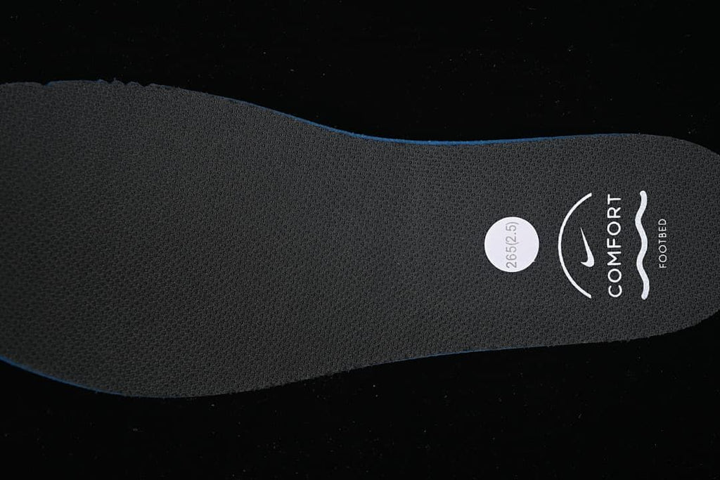 Close-up of a dark footbed marked Comfort and Footbed, with a 265 sticker