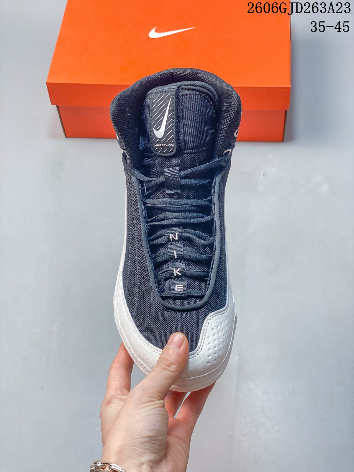 Front view of the lace-up Nike wrestling shoe