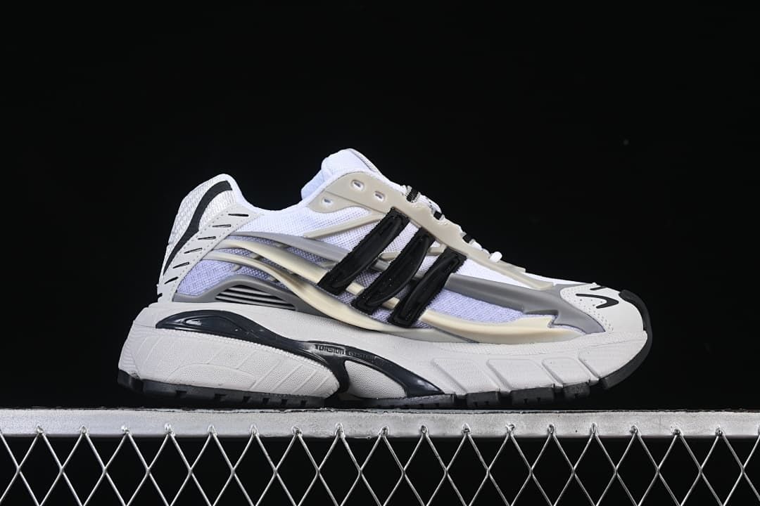 Side profile showing the layered upper and sculpted sole