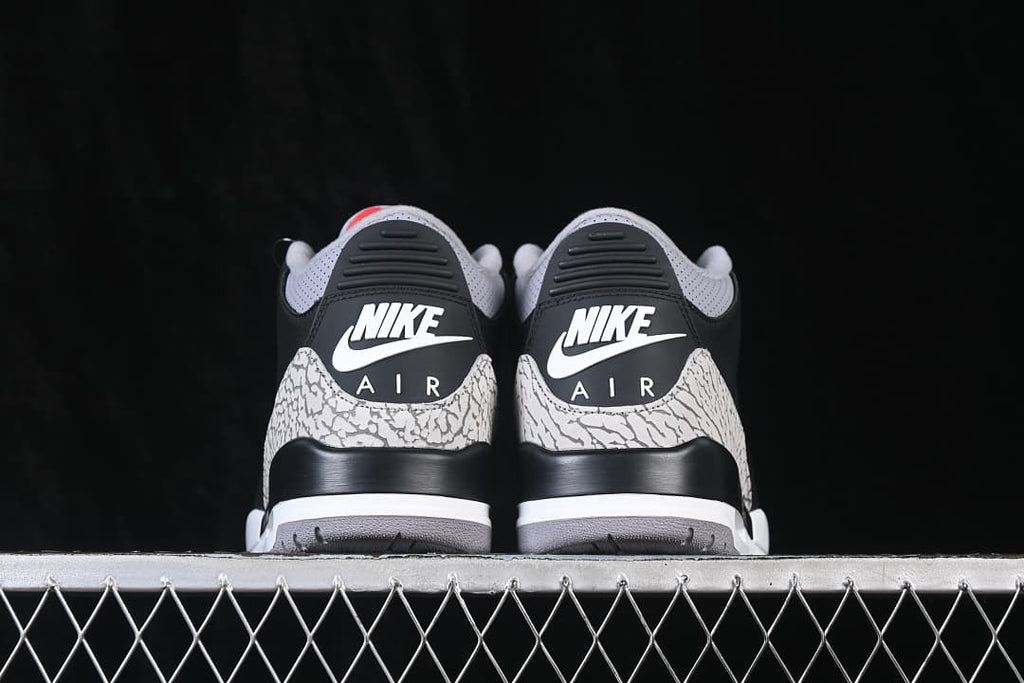 Rear view showing Nike Air branding and elephant-print heel panels