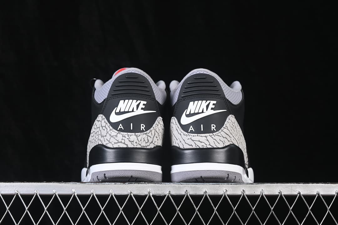 Rear view showing Nike Air branding and elephant-print heel panels