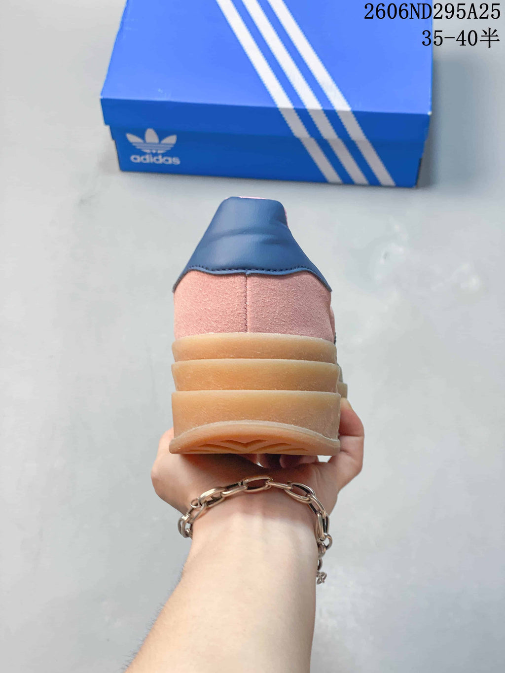 Rear view showing the layered platform sole and navy heel detail