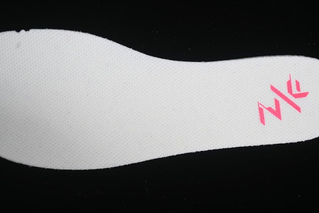 Close-up of the white insole and pink graphic