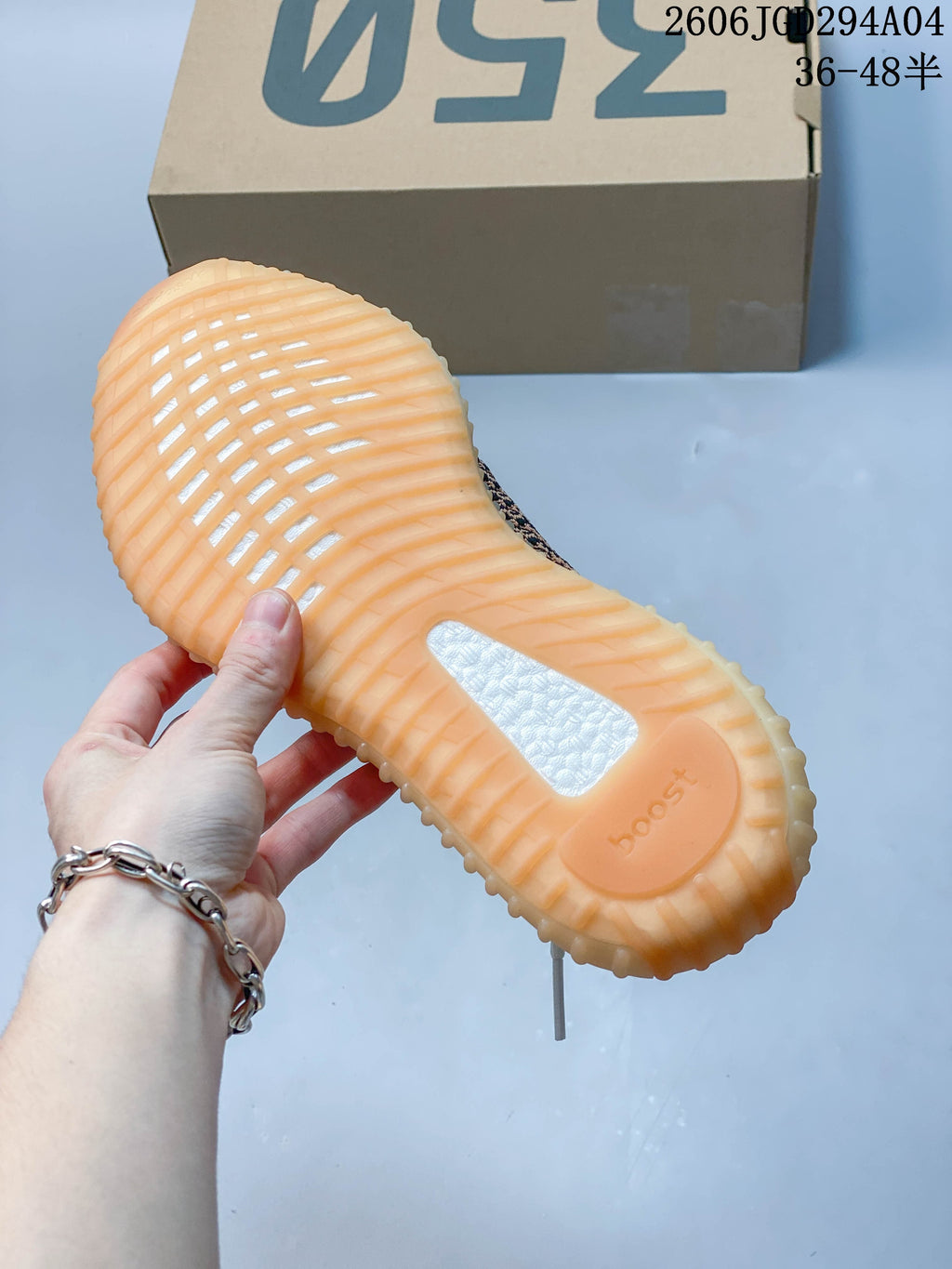 Close-up of the translucent amber-toned ribbed outsole