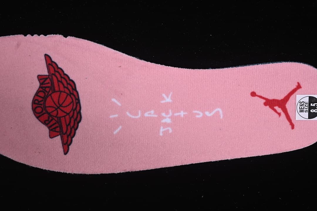 Pink insole with Jordan branding and a photographed size label